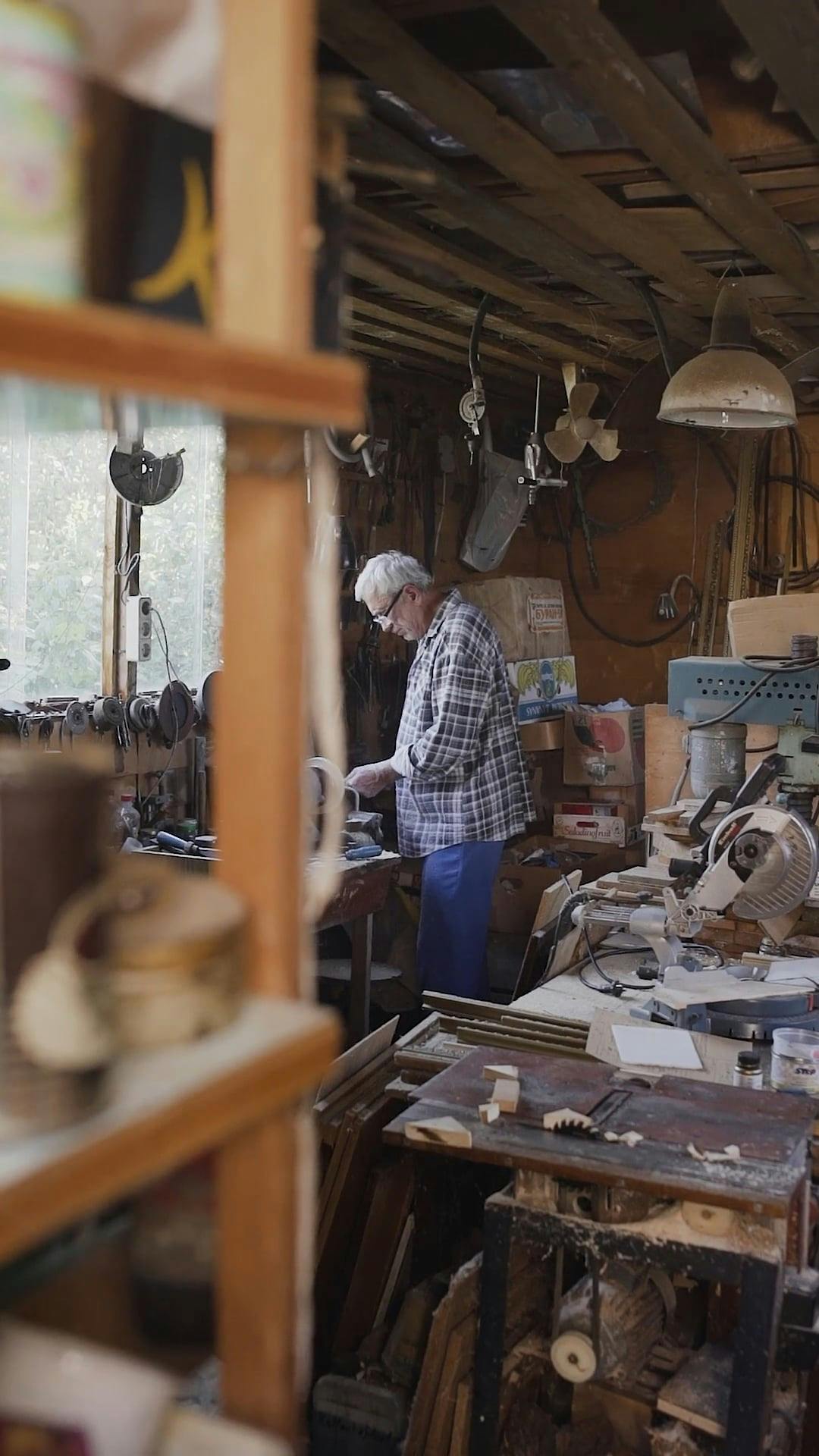 A Man Woodworking at a · Free Stock Video