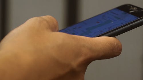 Close Up Video of a Person Using Cellphone