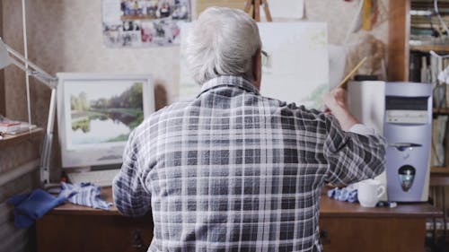 Elderly Man Painting
