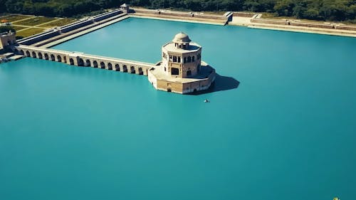 Drone Video of Historical monument Surrounded by Blue Lake
