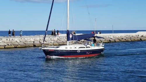 A Motor Boat Sailing in the Ocean