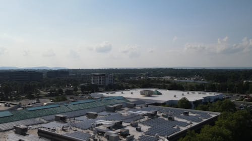 Drone Footage of Solar Panels on a Rooftop