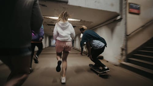 People Running at an Underpass