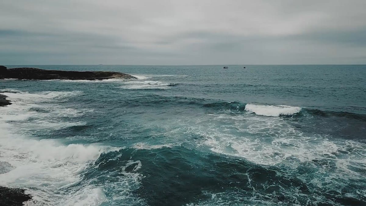 Drone View Of Big Waves Rushing To The Shore Free Stock Video Footage ...