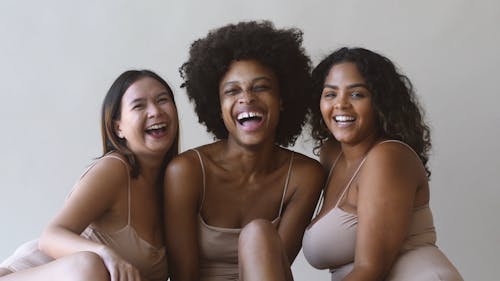 People Modeling Wearing a Swimwear