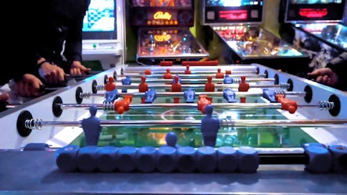 People Playing Table Football