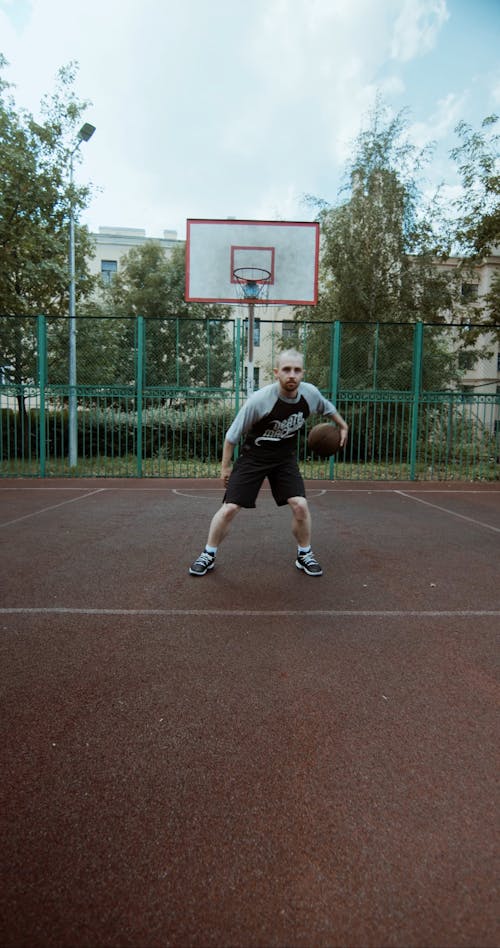 Man Dribbling a Basketball