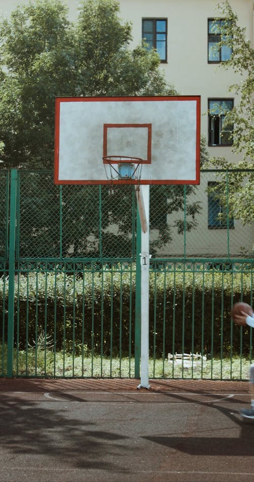 Person Playing a Basketball