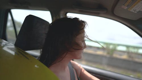 Woman Driving a Car 