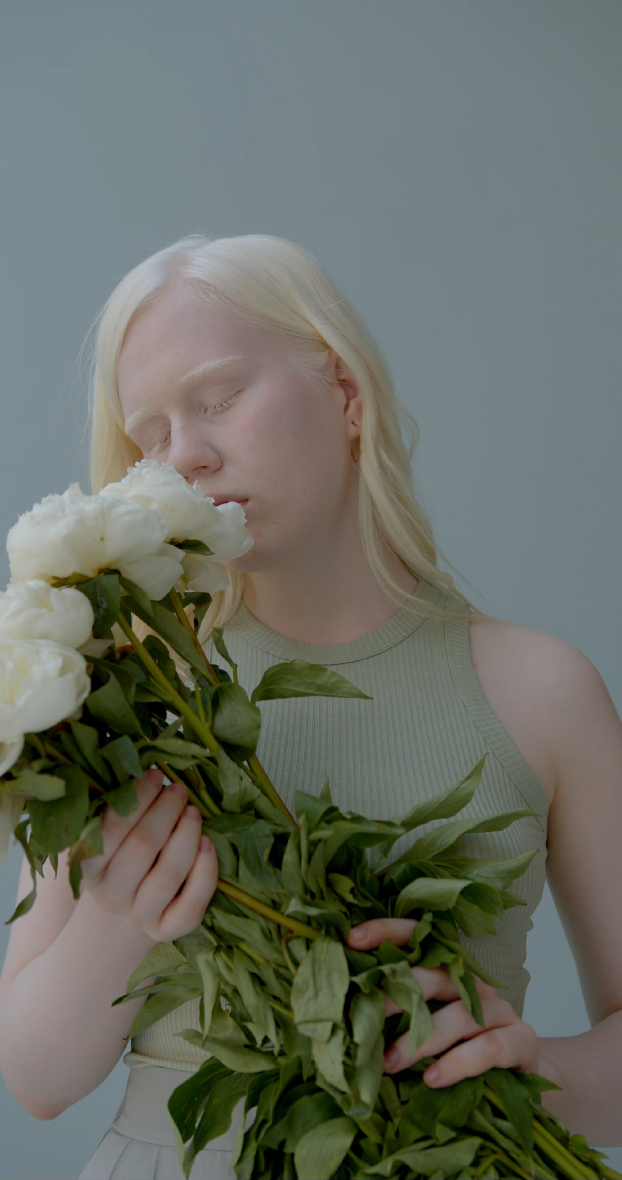 Woman Smelling White Flowers Free Stock Video