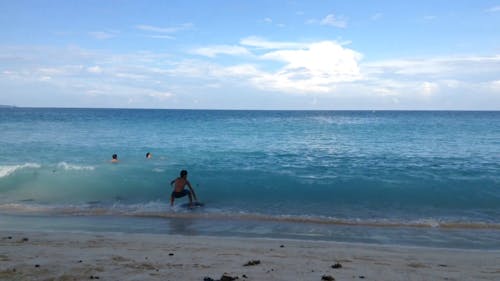 Kids Surfing on Shore