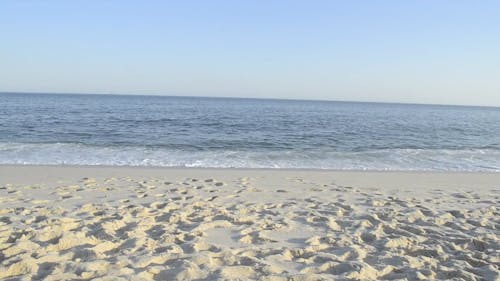 Waves Rushing on the Sandy Shore