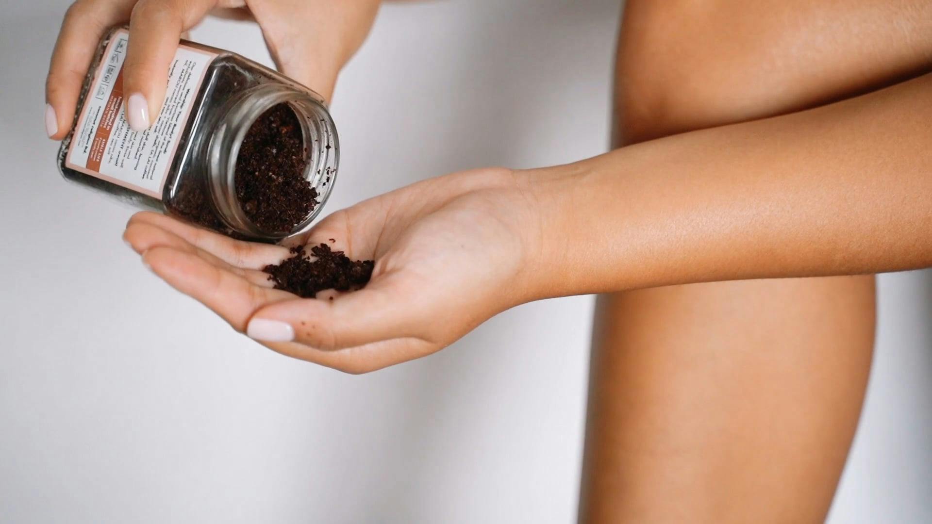 CloseUp View of a Person Putting Coffee Grounds in Her Leg · Free