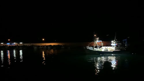 Night Video of a Fishing Boat at the Port