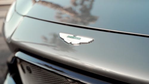 Close-Up View of an Aston Martin Emblem