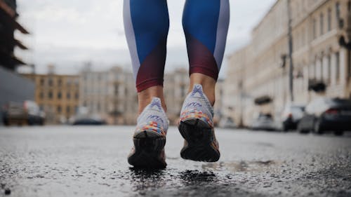 Woman Running on the Street