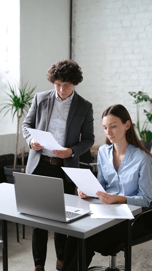 Man Presenting a Document