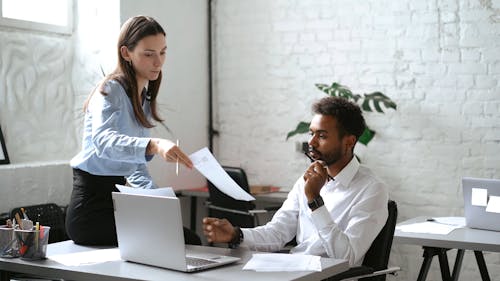 Woman Presenting a Document 