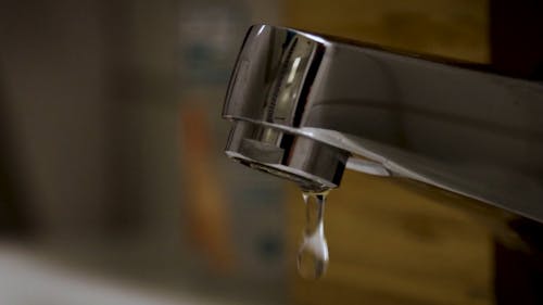 Water Dripping from Faucet