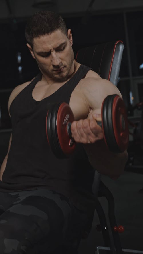 Man Doing Arm Workout at Gym