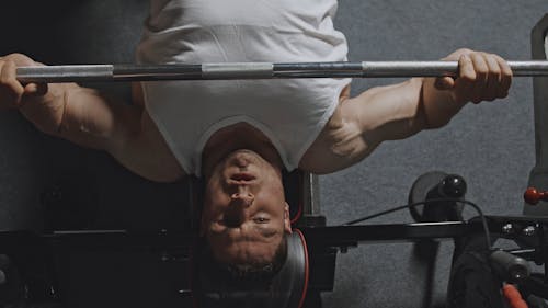 A Person Doing Bench Press Workout