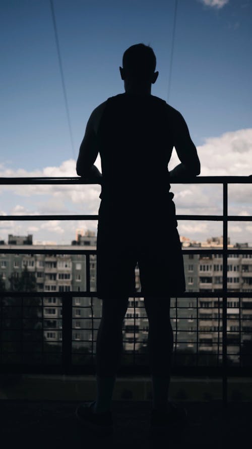 Silhouette of a Person Stretching