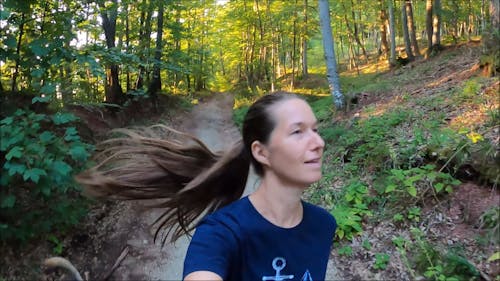 Woman Walking in the Woods