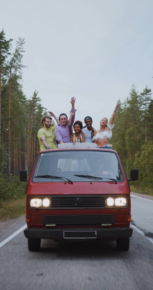 A Group of Friends Standing at Back of a Pickup Truck