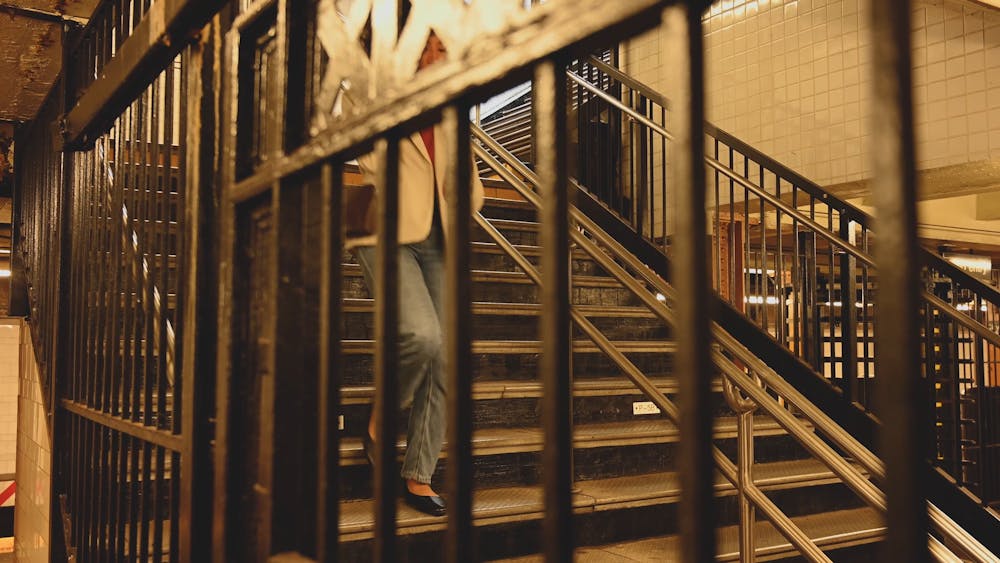 A Woman Going Down on Stairs · Free Stock Video