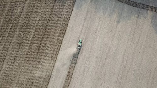 Aerial View of Harvesting a Farmland