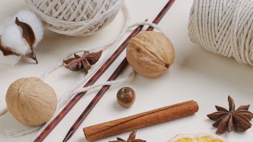 Walnut Cinnamon and Cotton Placed in Flatlay