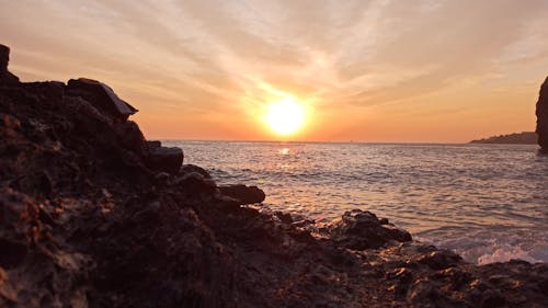 Golden Sunset at a Rocky Seabeach