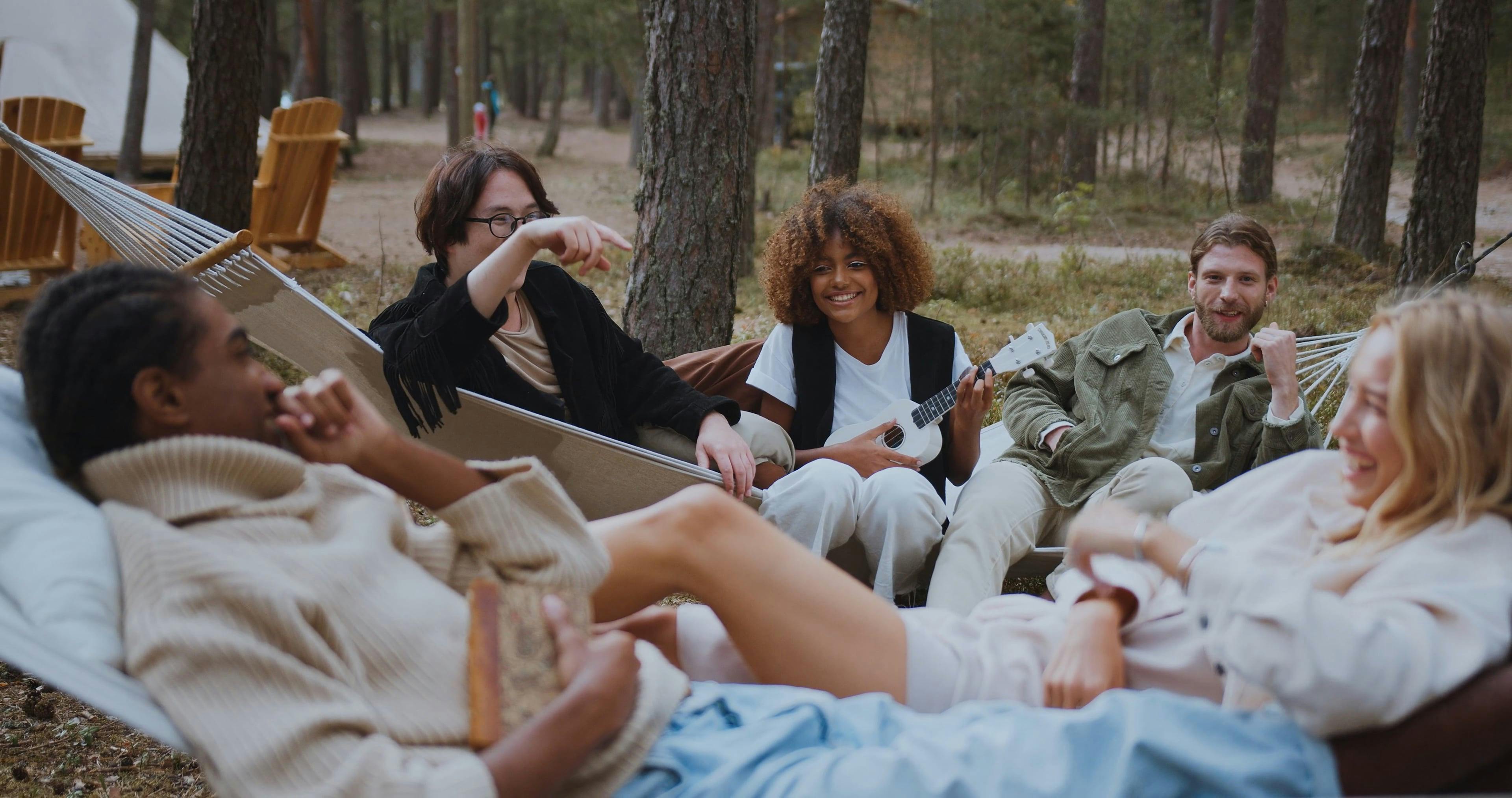 A Group of Friends Chilling in Woods · Free Stock Video