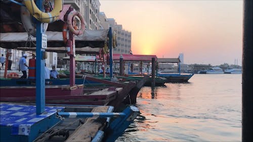 A Video Footage of Buildings and Sailing Boats