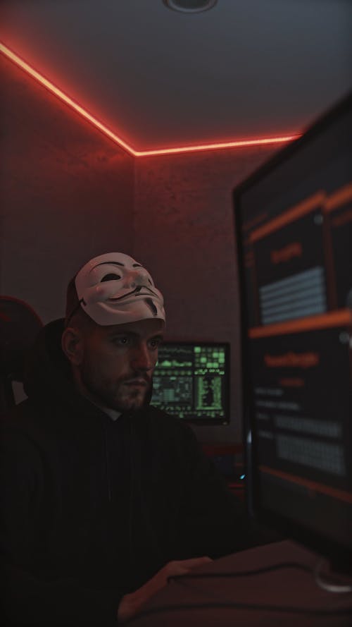A Hacker Wearing a Mask