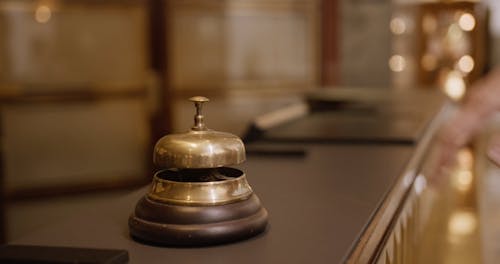 Close-Up Video of a Hotel Desk Bell