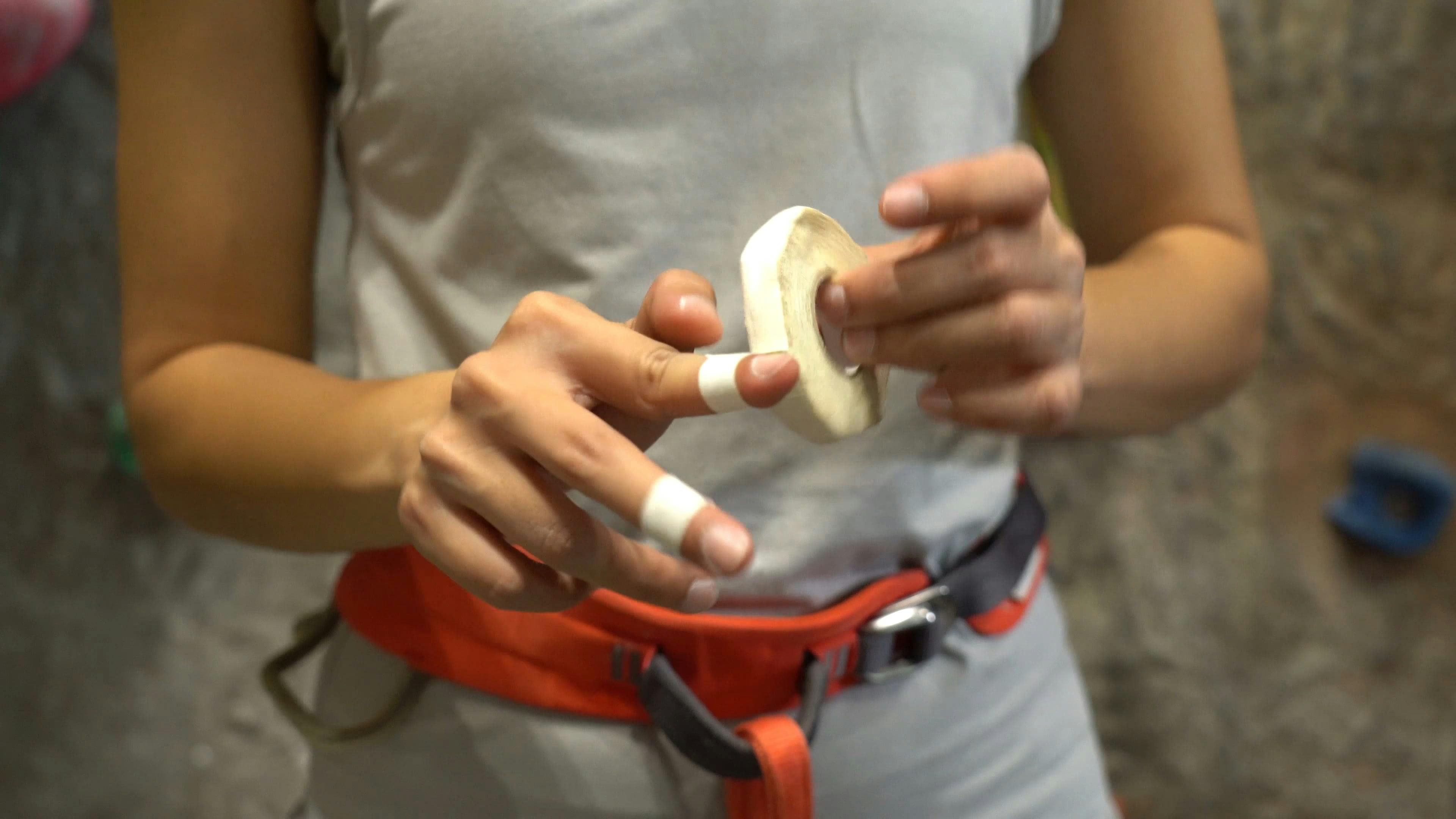 Taping Fingers for Climbing Close up Free Stock Video Footage, Royalty