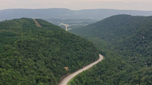 A Road Built In Mountain Slopes