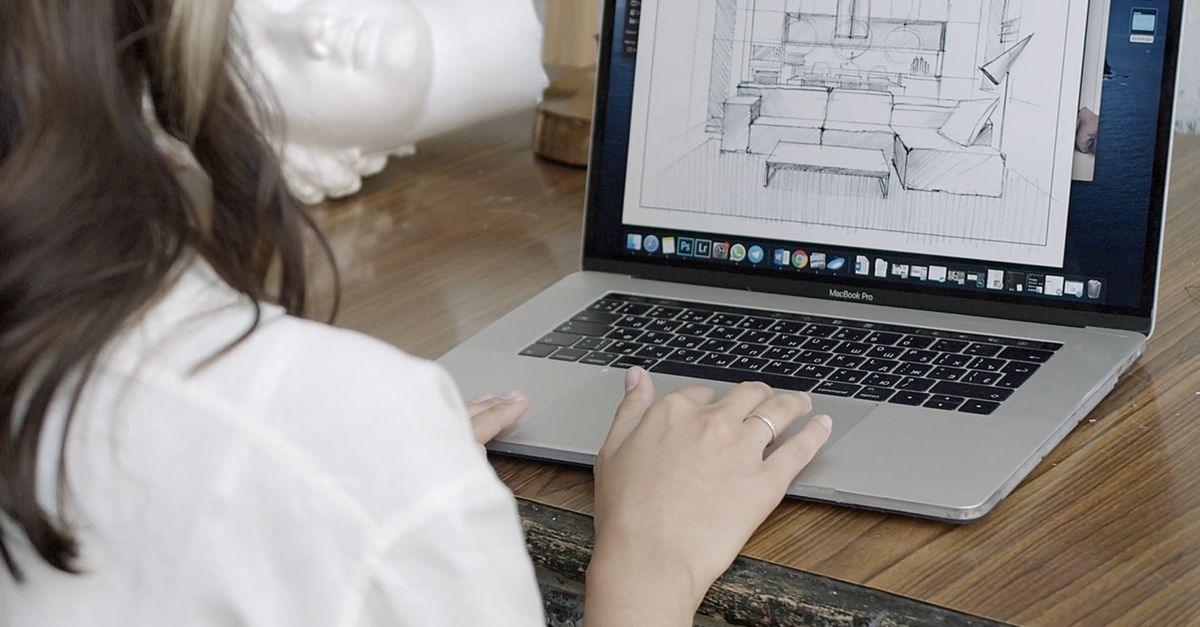 Person Using Computer Making Designs A Woman Using A Computer Laptop In Making A Design Free Stock Video ...