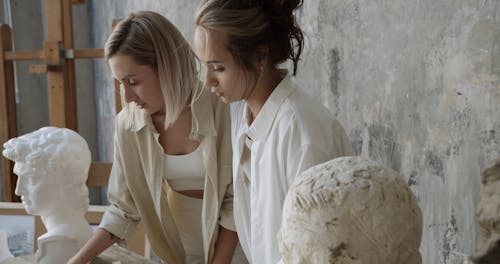 Two Women Looking At Prospect Design For The Interior Finish