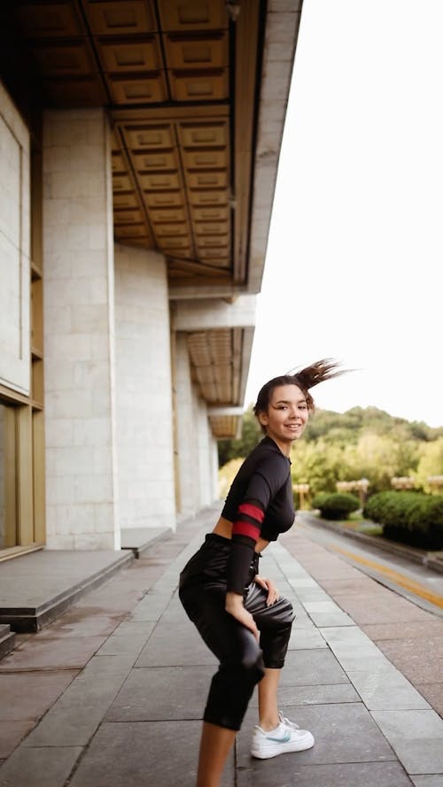 Woman Dancing Outdoors