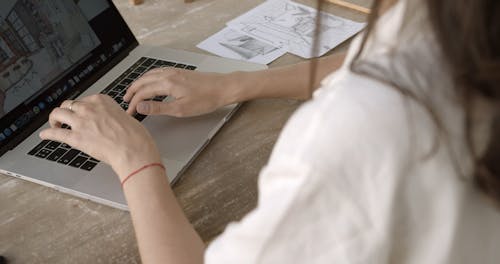 Person Typing on the Laptop