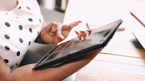 A Person Using a Tablet