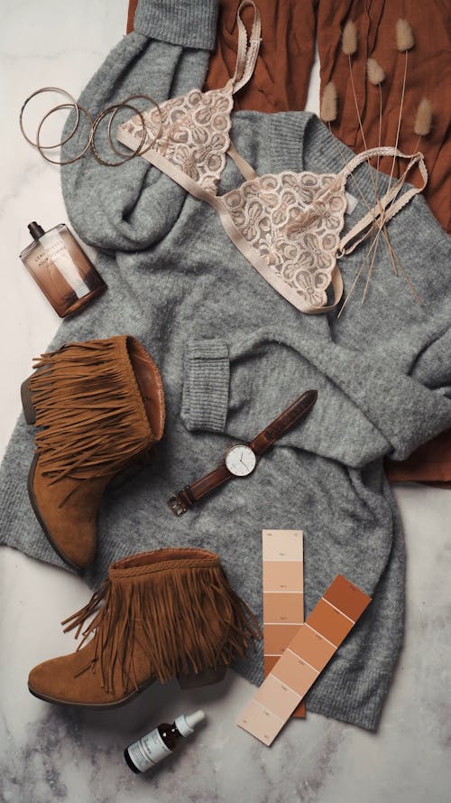 Flat Lay Arrangement of Women Clothings