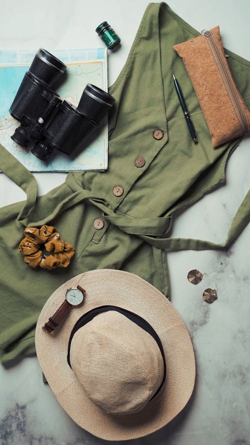 Flat Lay Arrangement of Clothing for Woman Travelers