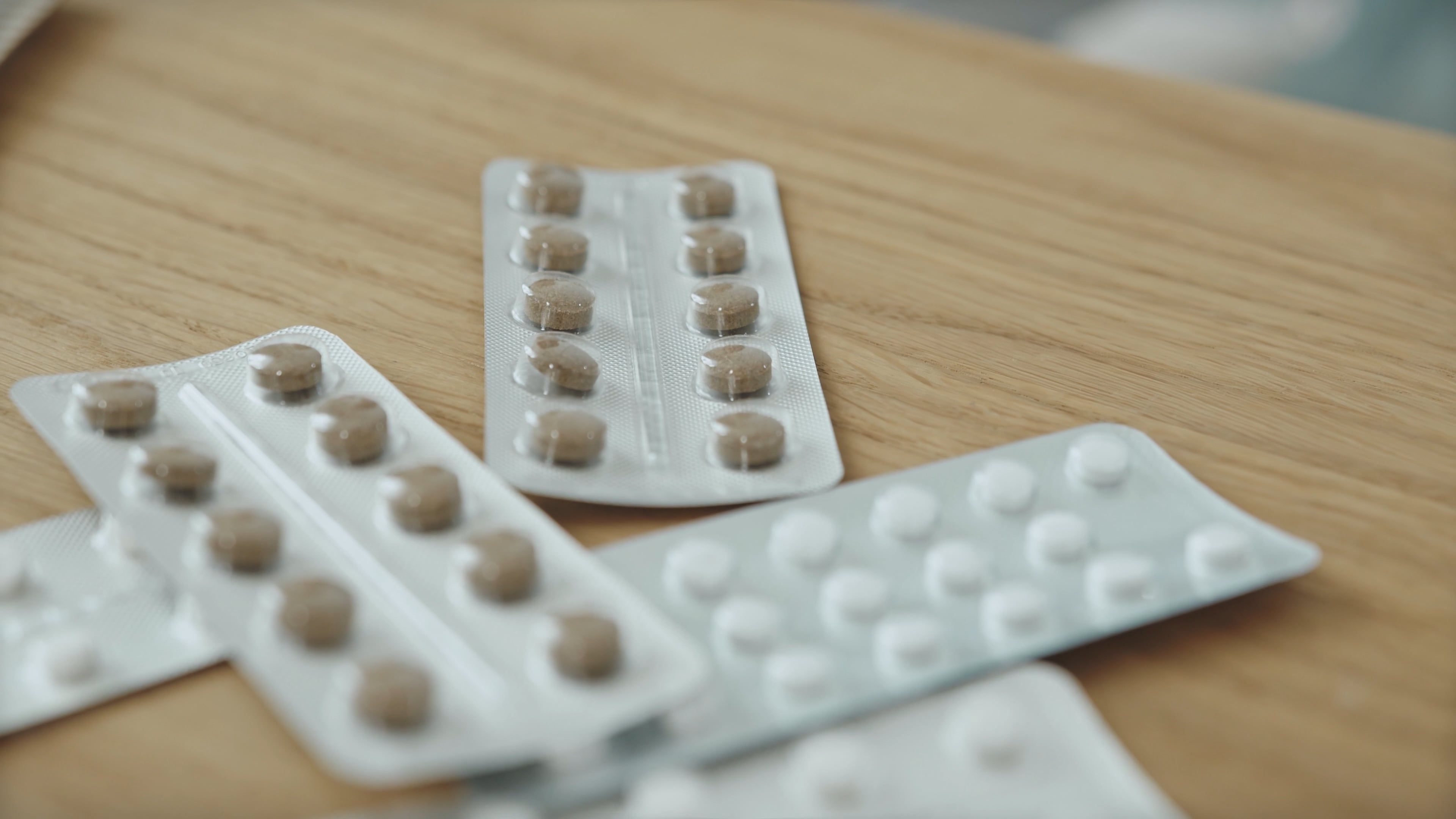 Aerial View of Medicine Strips on a Table · Free Stock Video