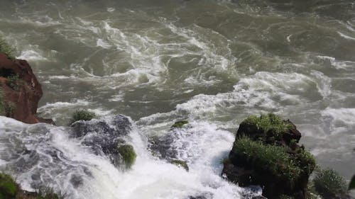 Cascading Waters Down to a River