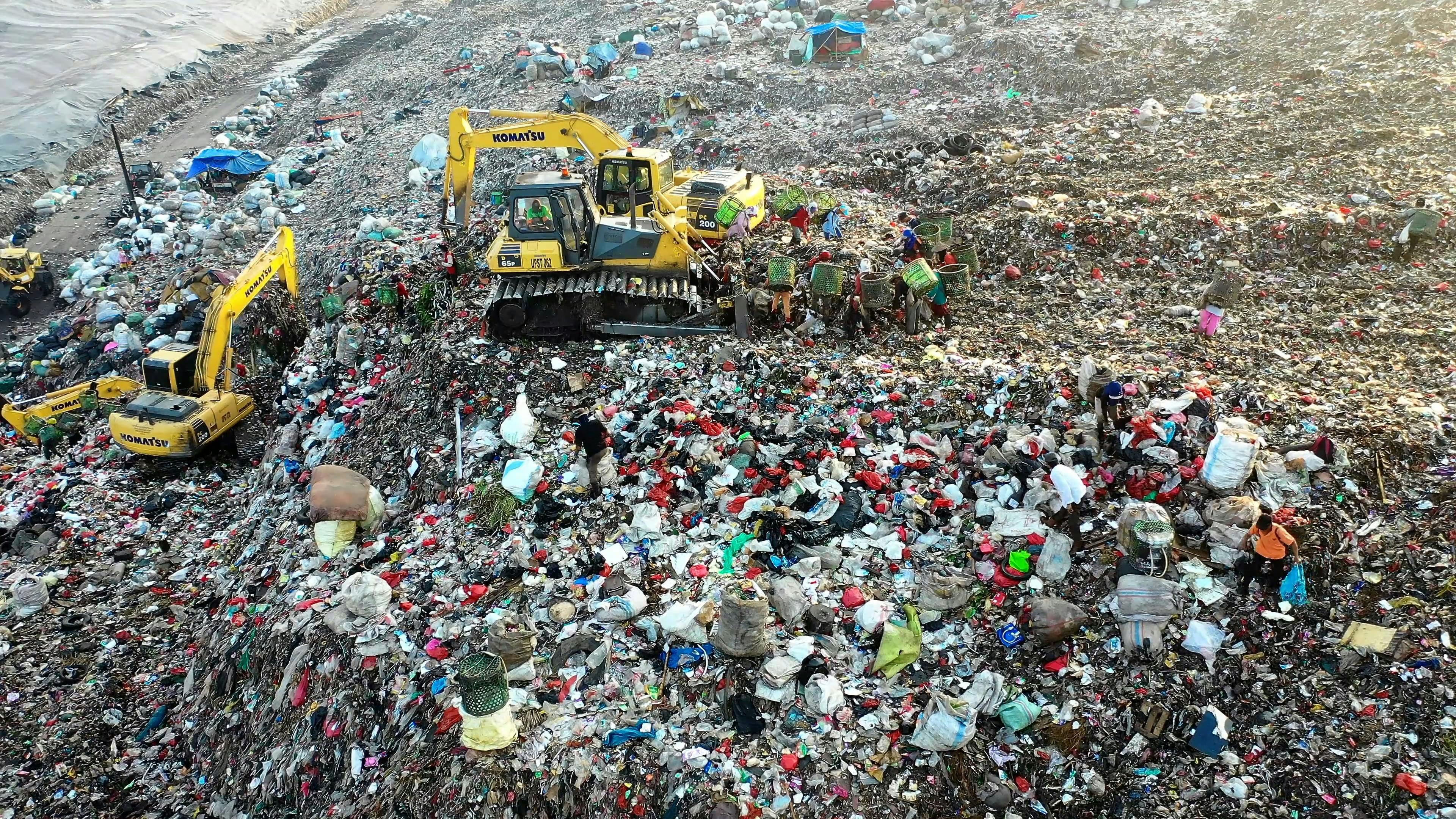 Excavators at a Tash Dumping Area · Free Stock Video