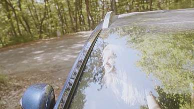a woman riding a car