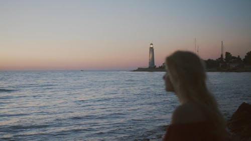 Woman Looking at Sea Horizon